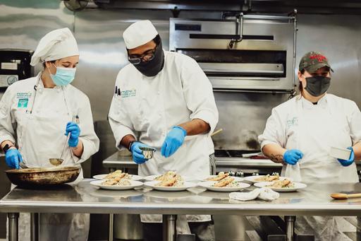 Tri-C culinary students preparing meals